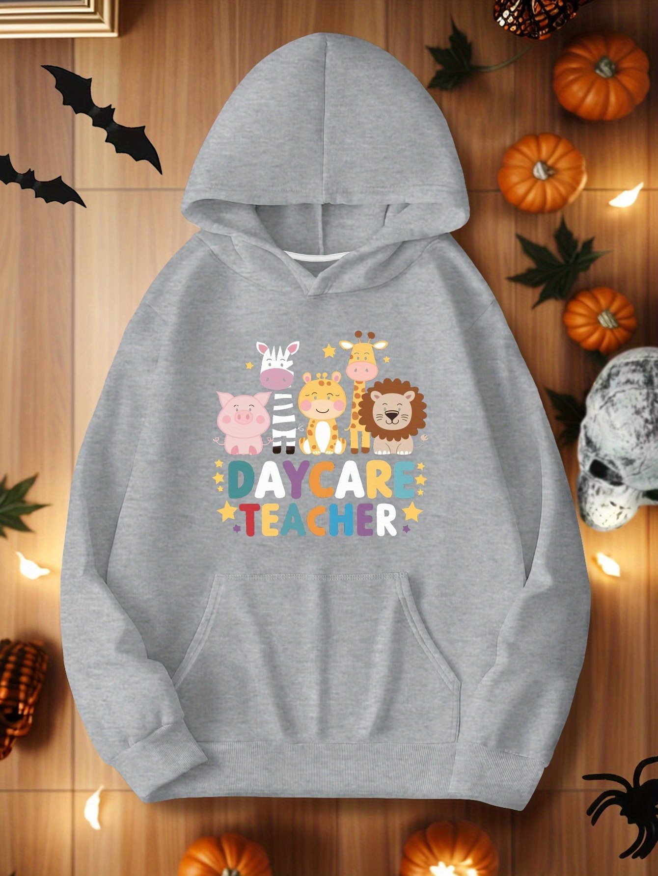 1727344724142-081631ac51934a81a147207f30a5b9d6-goods.jpeg DAYCARE TEACHER with animals women's plus size hoodies - Image 1